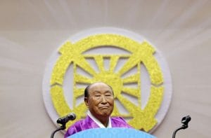 Evangelist Reverend Moon reacts as he delivers a speech in Gapyeong