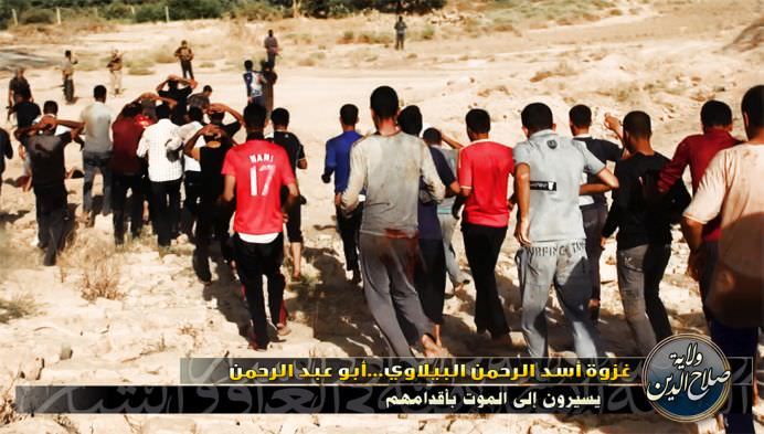 IMAGINI SOCANTE cu executiile a zeci de militari irakieni capturati de gruparea SIIL, afiliata AL-QAIDA!12