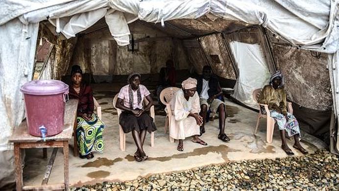 IMAGINI DE GROAZA care arata suferinta oamenilor infectati cu virusul EBOLA!4