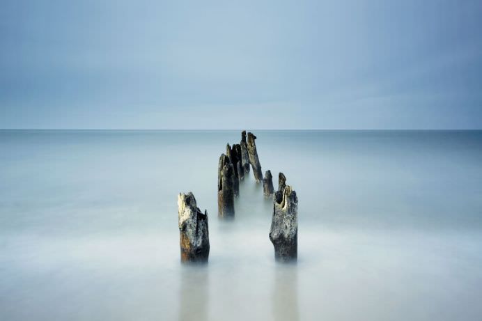 wooden breakwater on the ocean